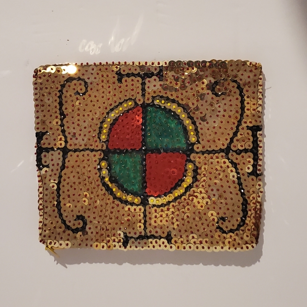 SEQUIN UNIQUE POUCH.